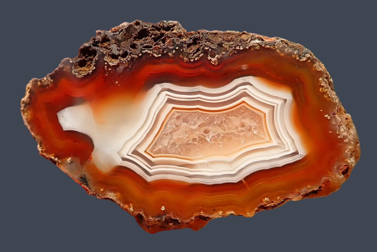 Malawi agate 57 mm – full polished face with white and cream fortification banding in deep red and burnt orange chalcedony, Ngabu, Malawi