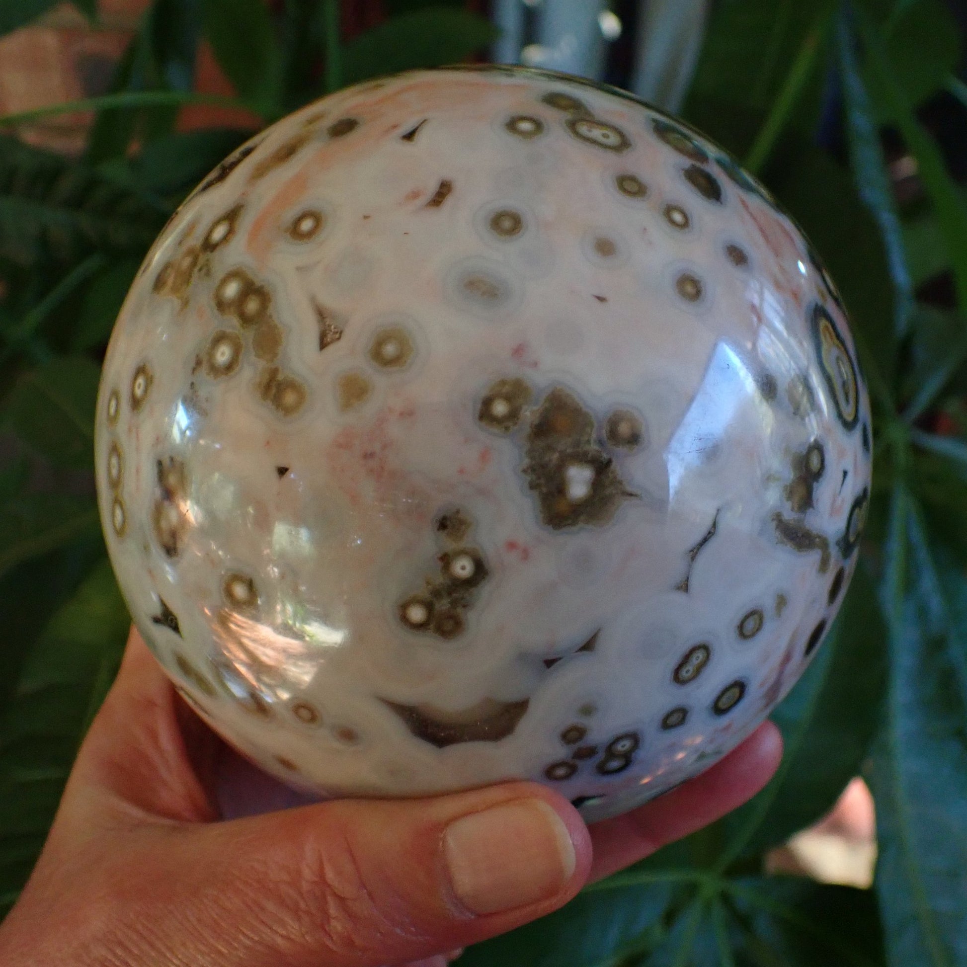 Ocean Jasper (Orbicular) Polished Sphere 115mm – cream face with scattered orb clusters, blush-pink chalcedony ground, 8th Vein Marovato Madagascar | SKU OM00004