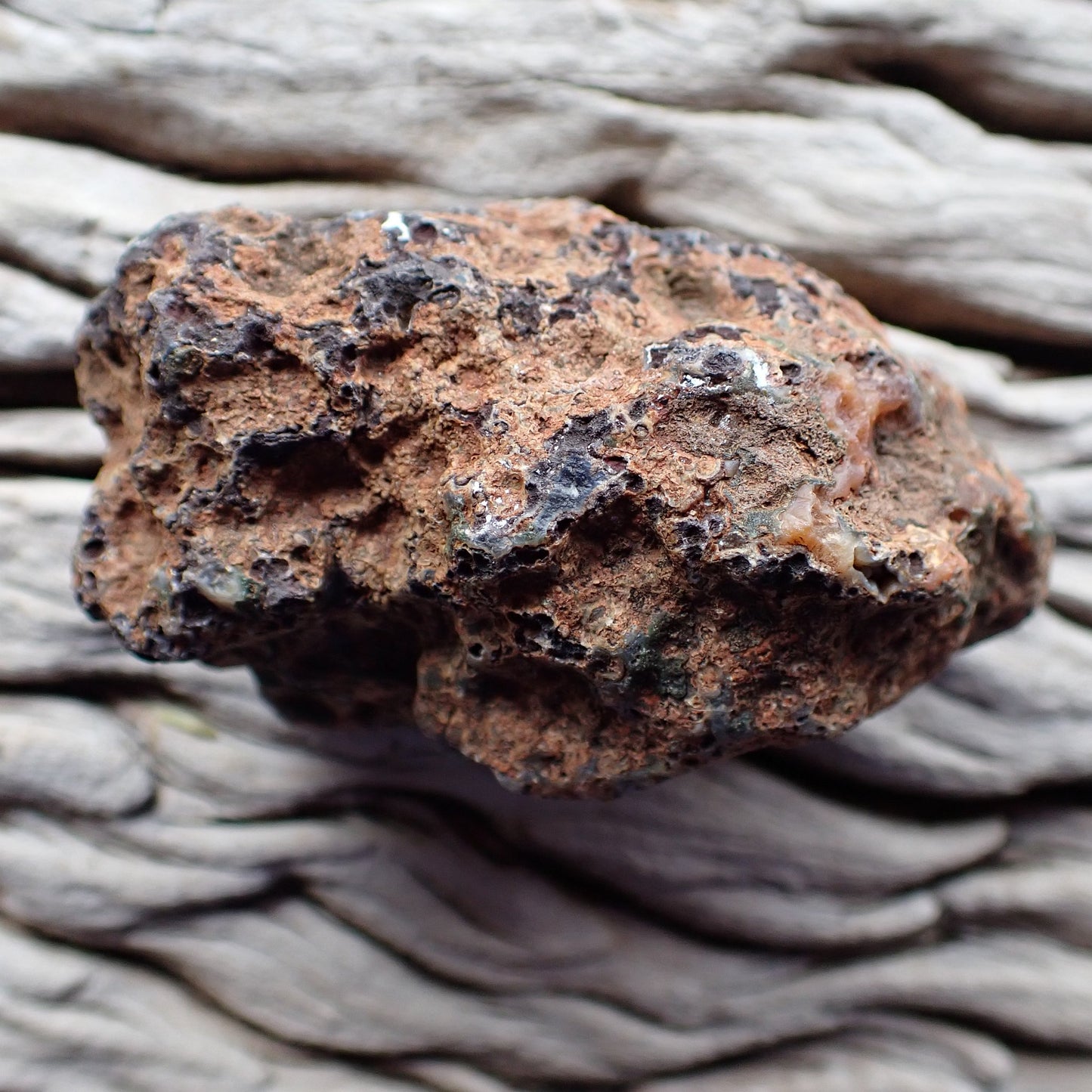 Unpolished rough side of Malawi agate showing natural texture