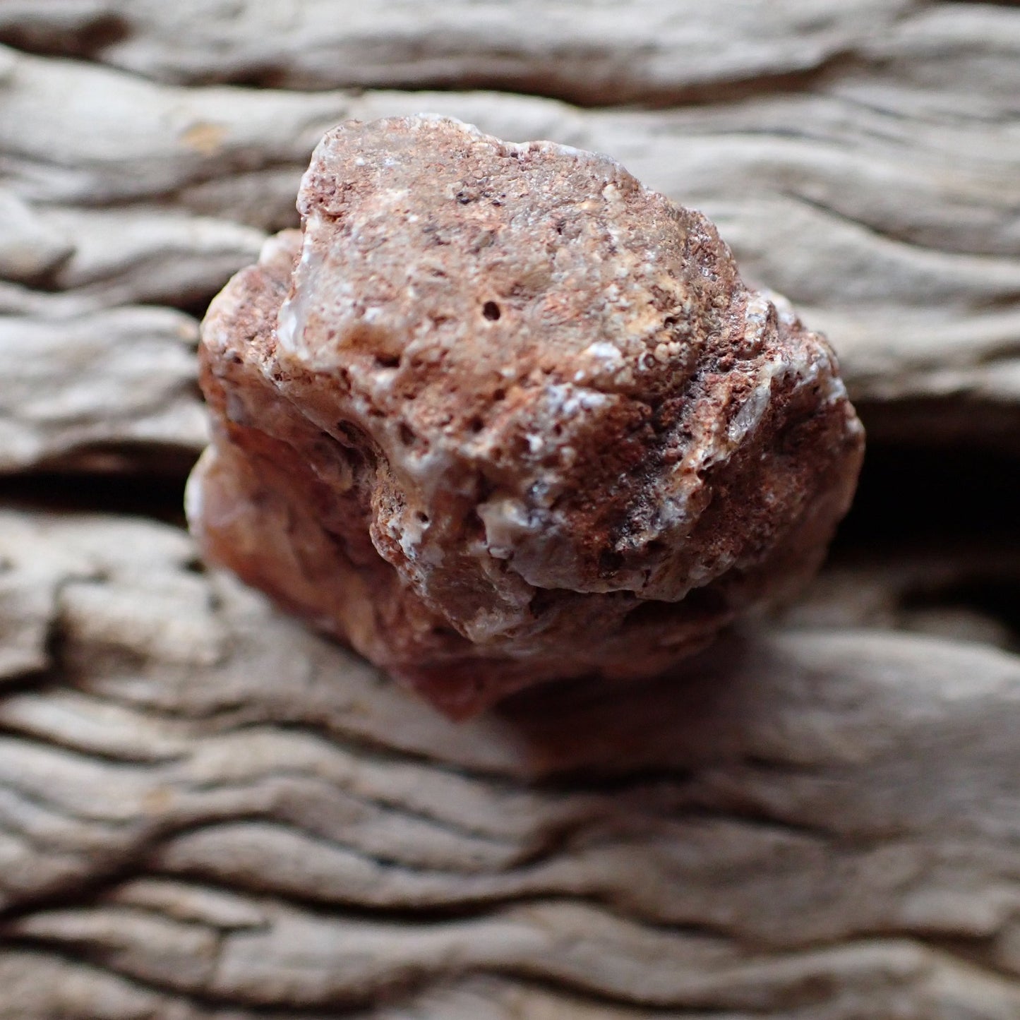 Unpolished rough side of Malawi agate showing natural texture