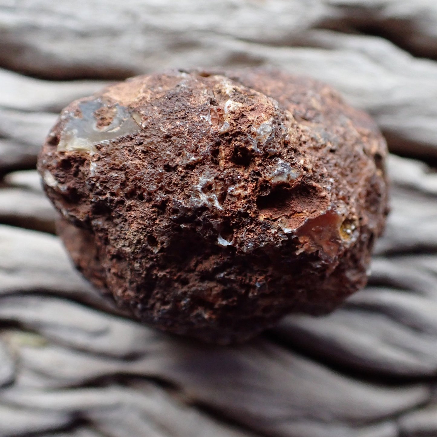 Unpolished rough side of Malawi agate showing its natural texture