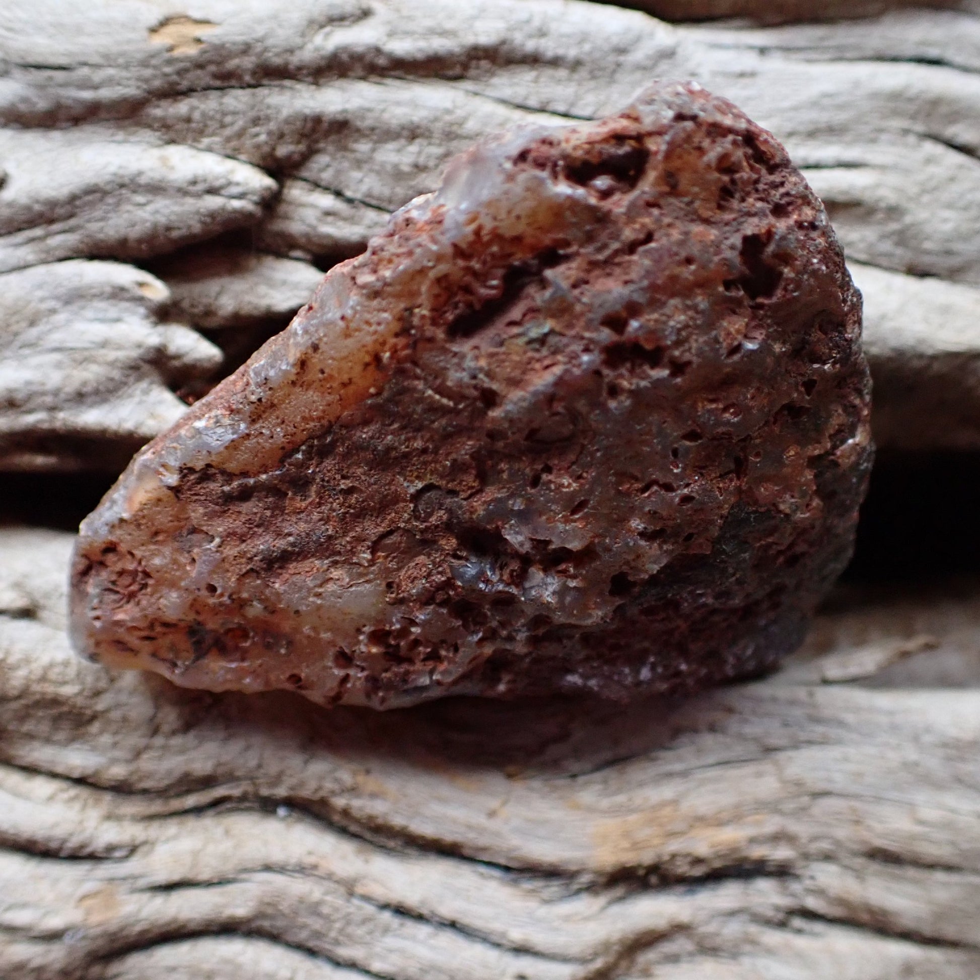 Back of Malawi agate 46 mm – heavily vesicular iron-stained exterior, Ngabu deposit, hand-polished in South Africa | SKU 000370