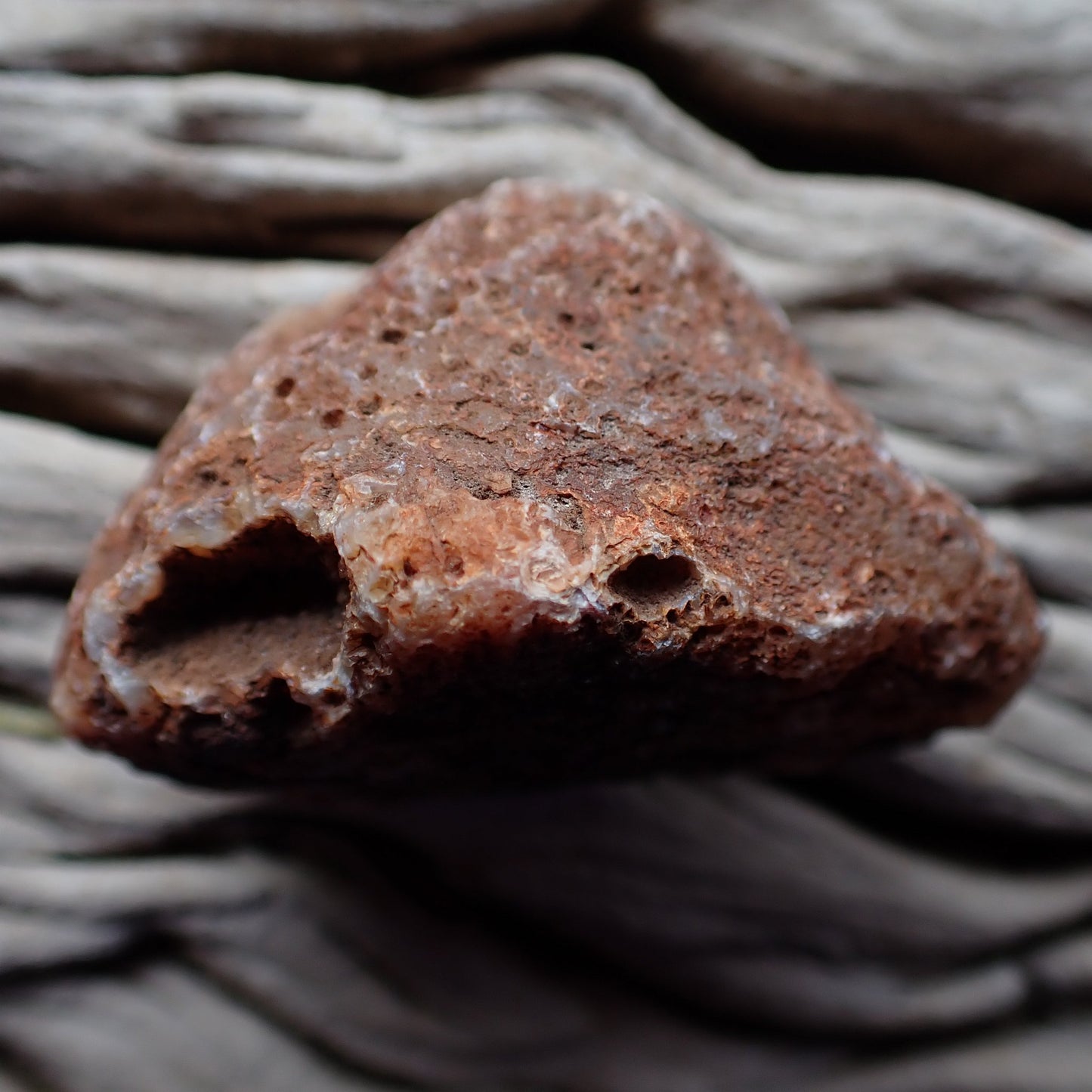 Unpolished rough side of Malawi agate showing natural texture