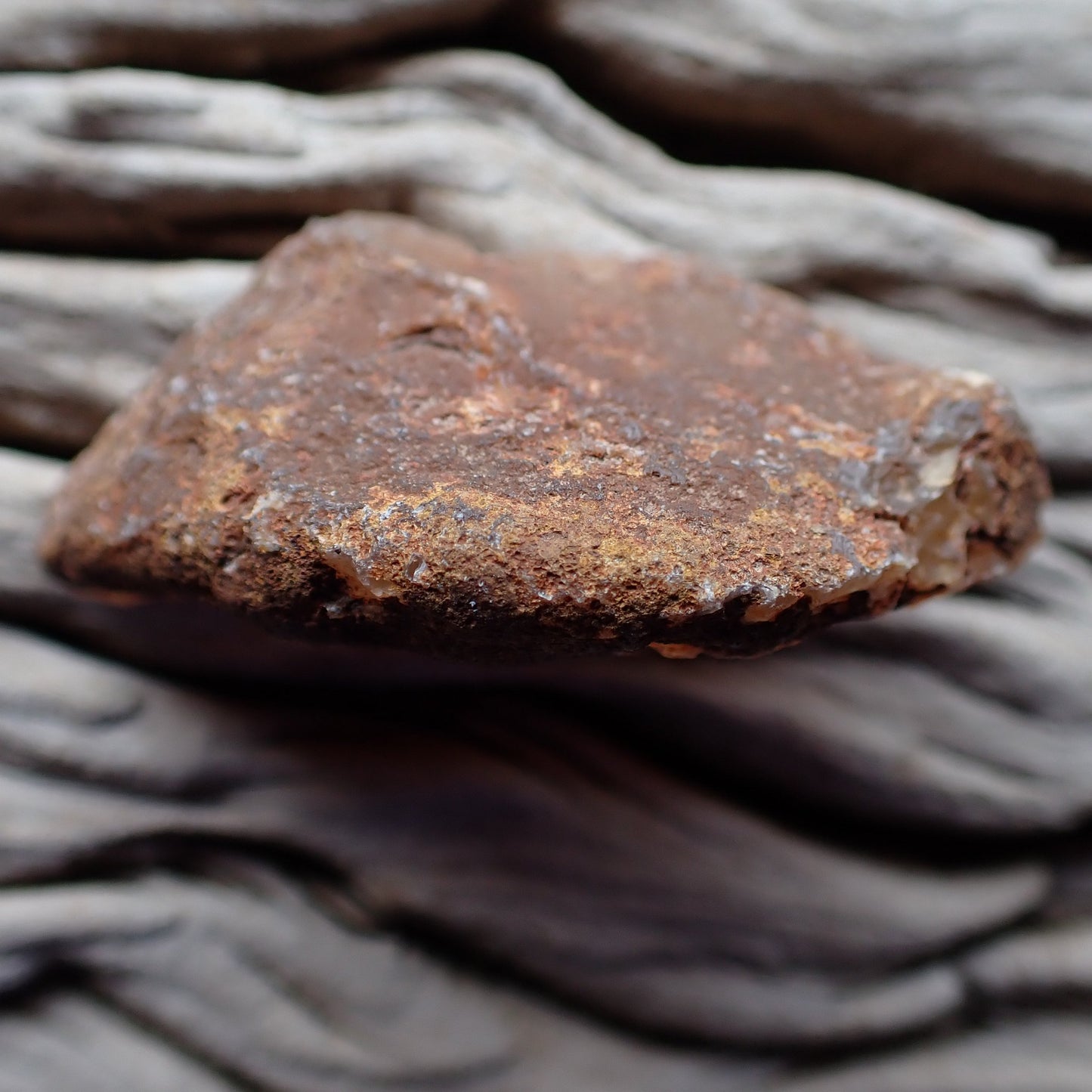 Unpolished rough side of Malawi agate showing natural texture