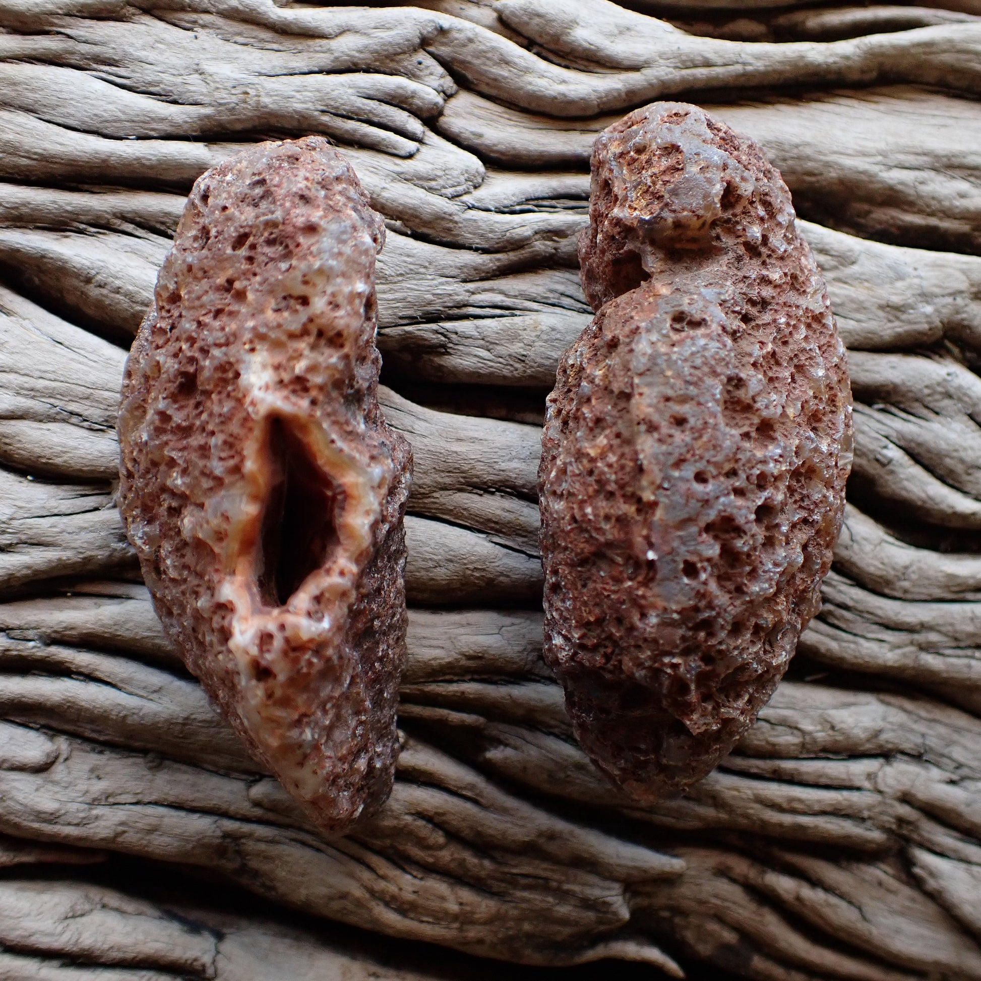 unpolished sides of a matching malawi agate pai