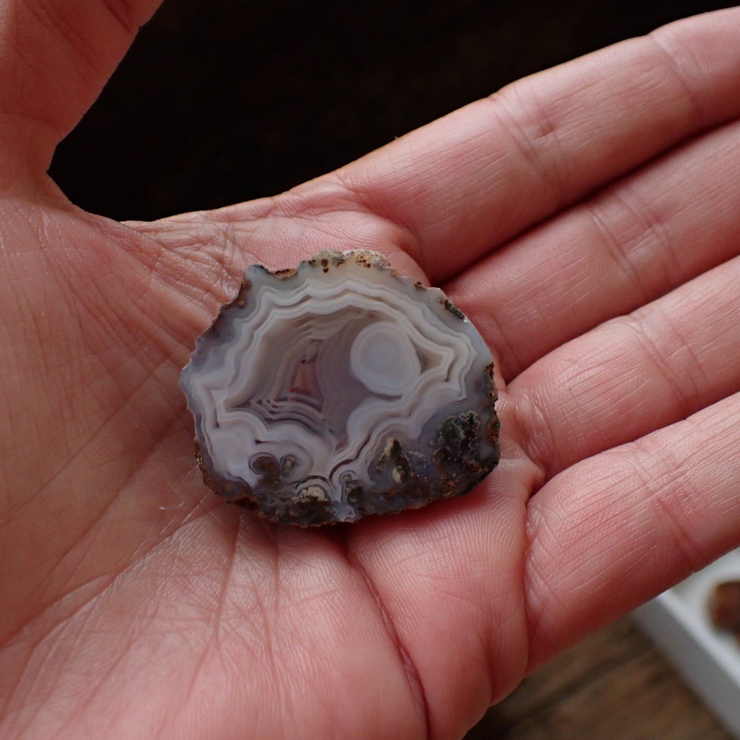 Natural hand-polished Malawi agate 36 mm – in-hand size reference, eye, flow channel, moss inclusions | SKU 000501