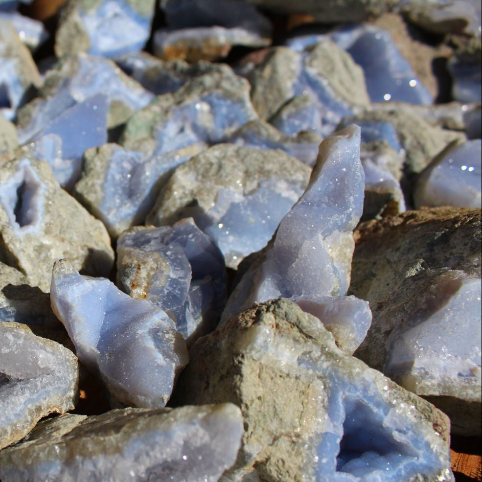 Wholesale Blue Lace Agate rough, Nsanje Malawi – macro close-up of single specimen showing deep blue banding and druzy chalcedony surface detail | SKU BLAperkg