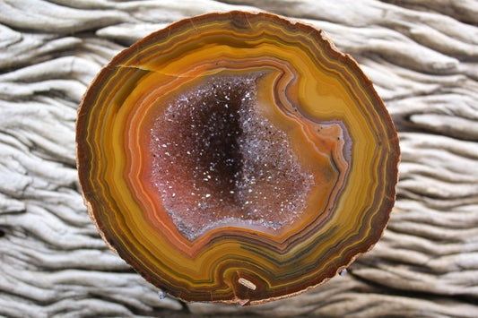 Lilangabi agate 94 mm – front face, druzy vug with open crystal cavity, concentric banding and chromatism, Eswatini | SKU LIL00001