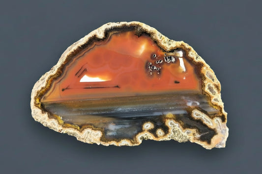 Lilangabi agate 72mm – main view, waterlines, dendritic inclusions, carnelian-red and dark banding contrast | SKU LIL00020