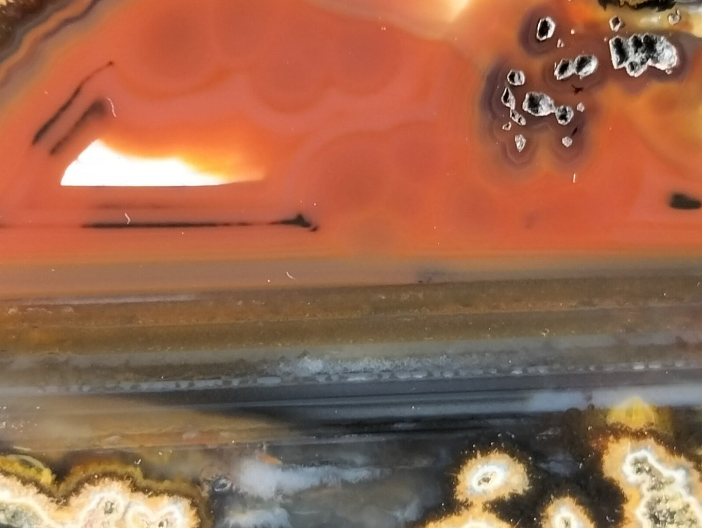 Lilangabi agate 72mm – close-up, waterlines and dendritic inclusions detail | SKU LIL00020