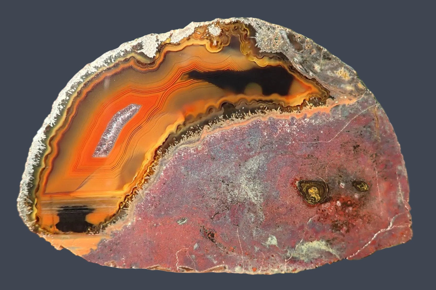Lilangabi agate 87 mm – front face, chromatism across orange-red and black banding, waterlines, Eswatini | SKU LIL00032