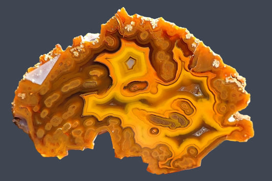 Lilangabi agate 110 mm – front face, multi-chambered structure, agate eyes, scalloped banding, amber-golden-yellow and orange palette, Eswatini | SKU LIL00036