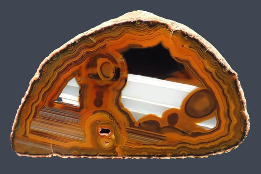 Lilangabi agate 73 mm – front face, multiple eyes, white waterline band & chromatography, Eswatini