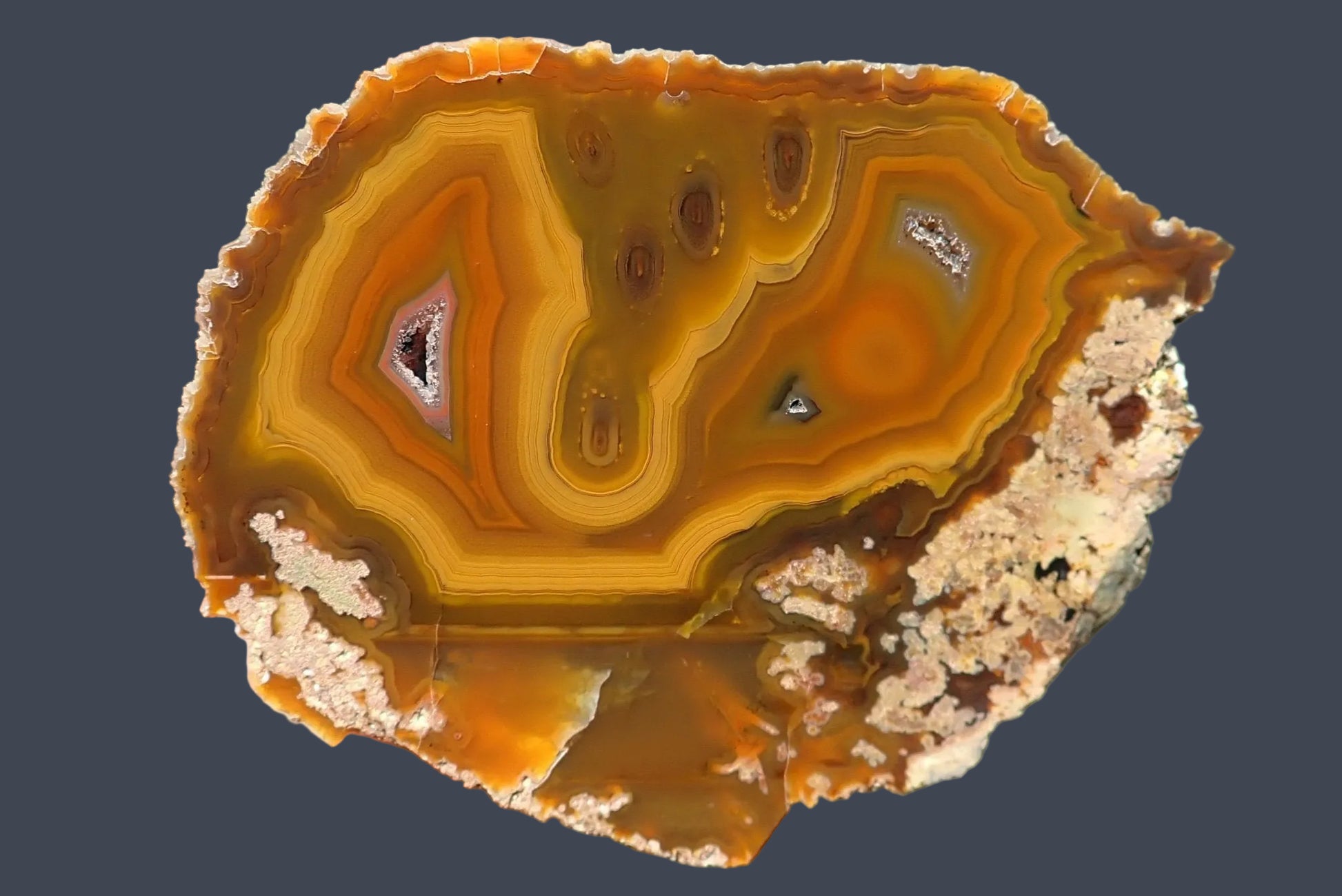 Lilangabi agate 75 mm – face view, fortification banding, drusy vugs, perimorph, deep amber and burnt orange