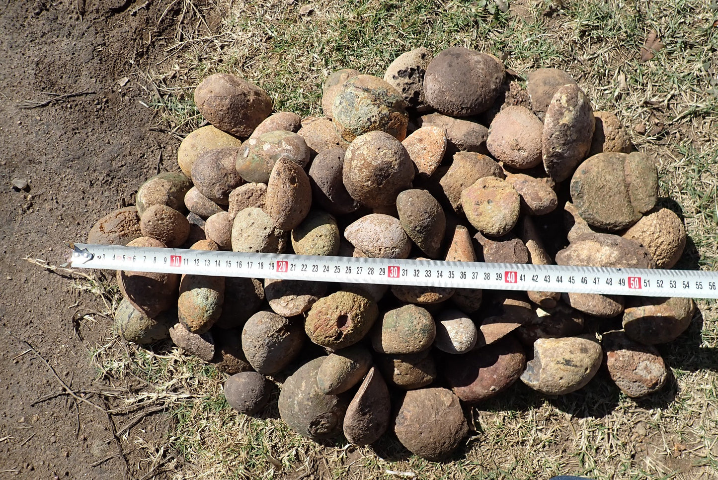 Lilangabi agate nodules – tape measure size reference, scalloped shell nodules, Lebombo, Eswatini