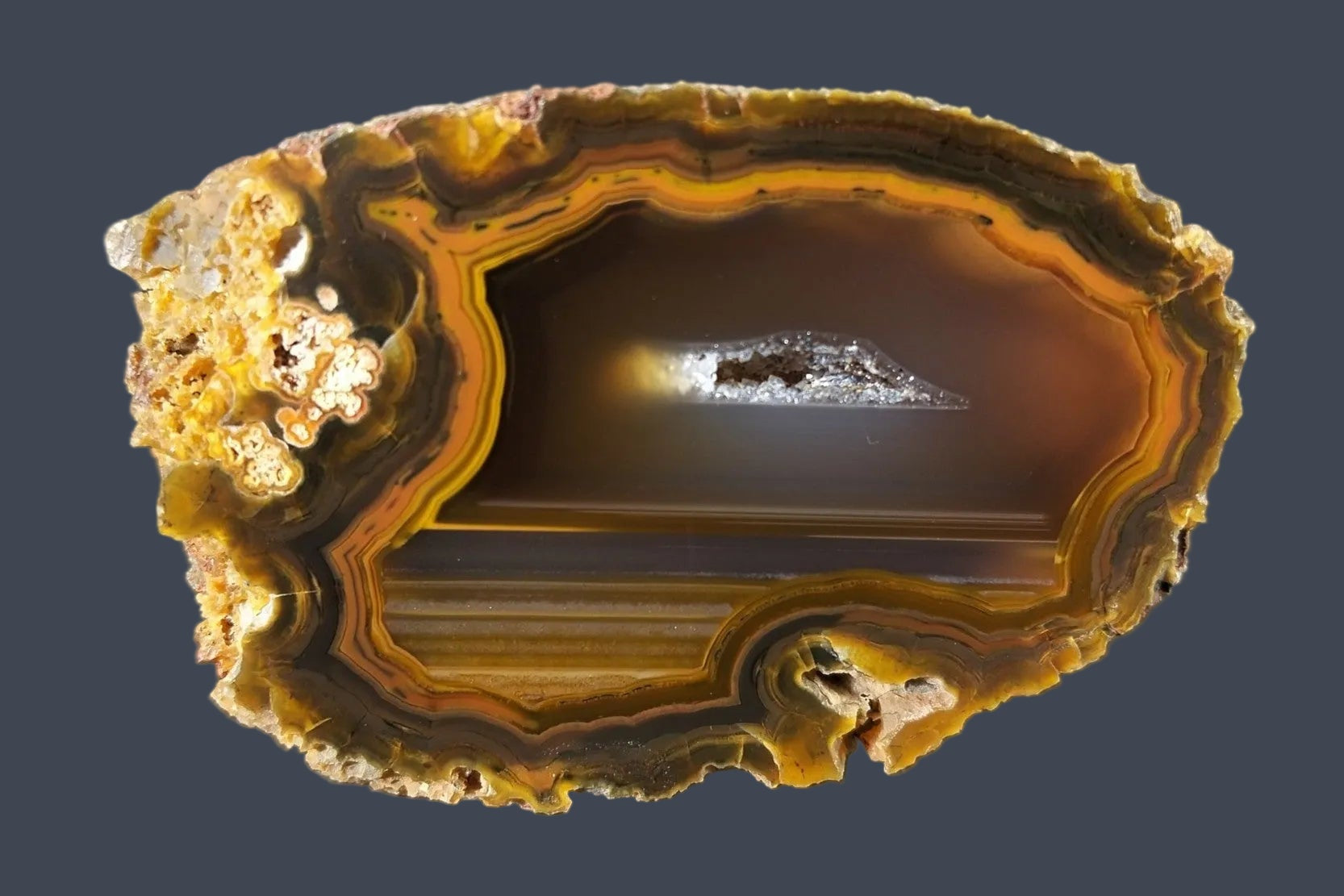 Lilangabi agate 64mm – main view, open vug, scalloped banding, amber-sard palette | SKU LIL00015
