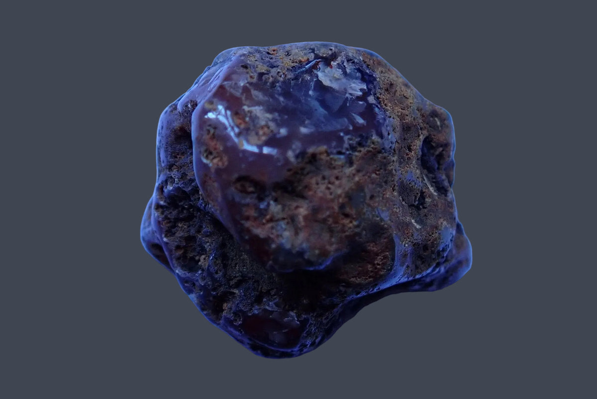 Malawi agate 41 mm – back view showing a partly polished rind , Ngabu, Malawi.