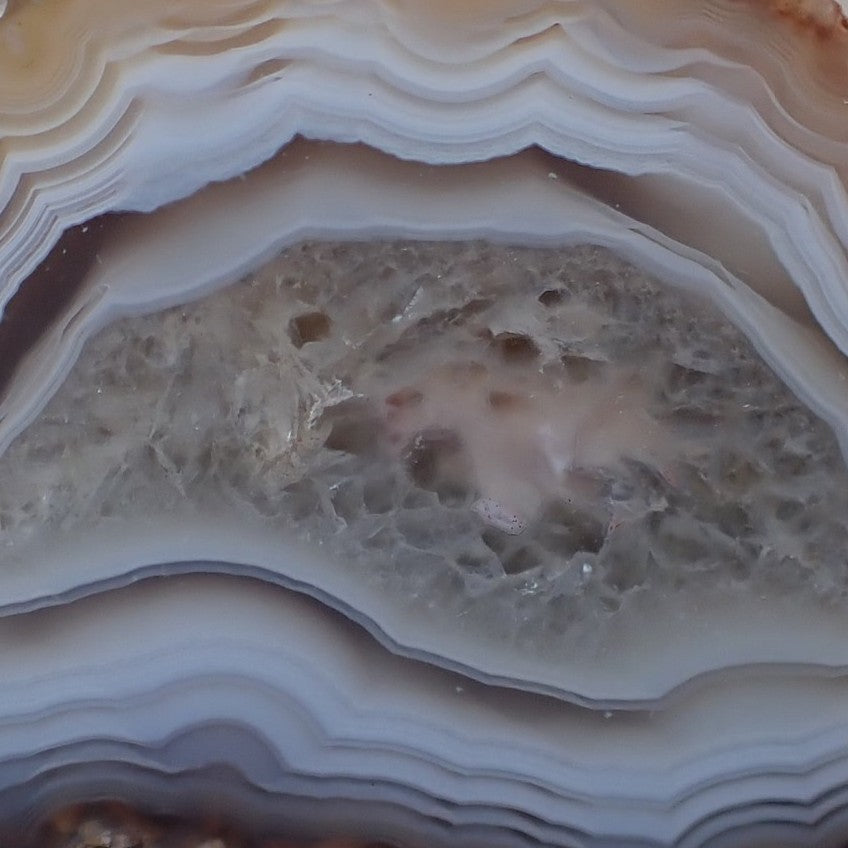 Crystalline centre of a Malawi agate with a floater