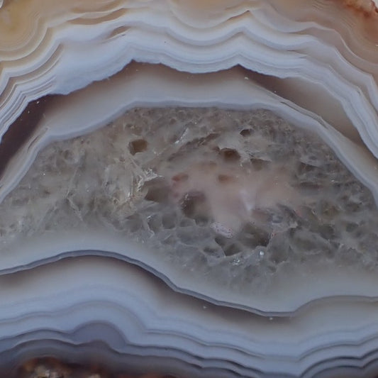 Crystalline centre of a Malawi agate with a floater