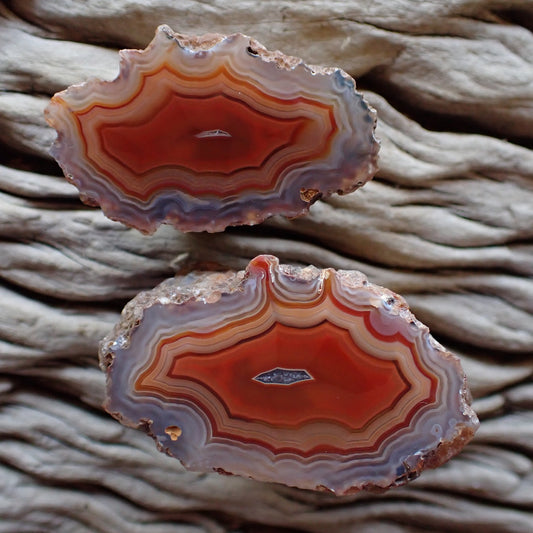 Stunning Malawi agate cut and polished pair with stunning fortification and ghost banding and flow channels and very pretty druzi centres