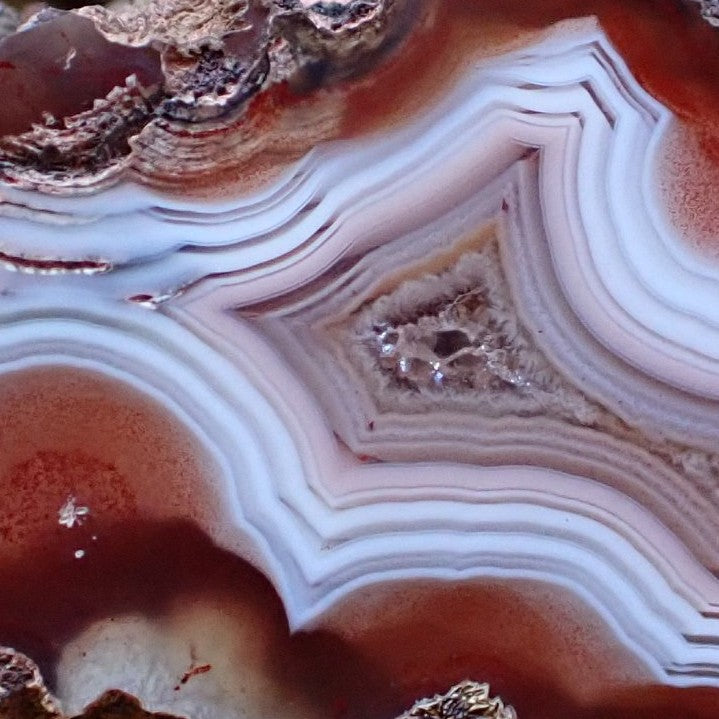 Natural hand-polished Malawi agate 37 mm – face detail, fortification banding, crystalline vug, Ngabu sourced | SKU 000482