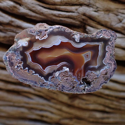 Main view of natural hand-polished Malawi agate 45 mm – front-facing full specimen, scalloped banding, shadow banding, flow channel, Ngabu Malawi | SKU 000488