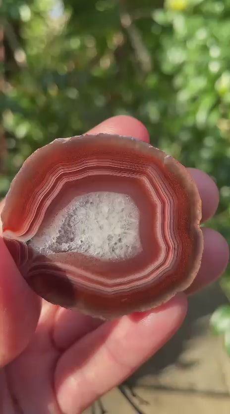 Parallax Malawi agate 45mm – rotating view, parallax, fortification banding, flow channel, ghost banding | SKU 000357