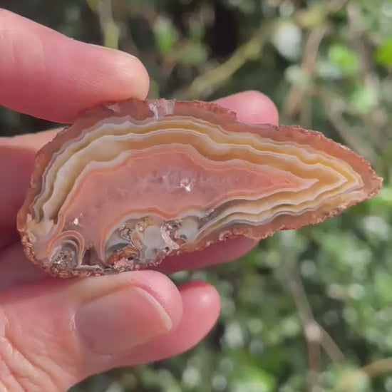 Natural hand-polished Malawi agate 58 mm – rotating view, flow channel, fortification banding, ghost banding | SKU 000500