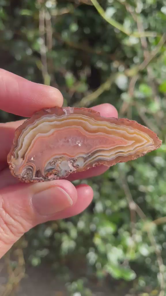 Natural hand-polished Malawi agate 58 mm – rotating view, flow channel, fortification banding, ghost banding | SKU 000500