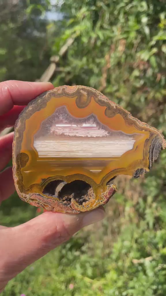 Lilangabi agate 87 mm – rotating view, fortification banding and waterline features | SKU LIL00004