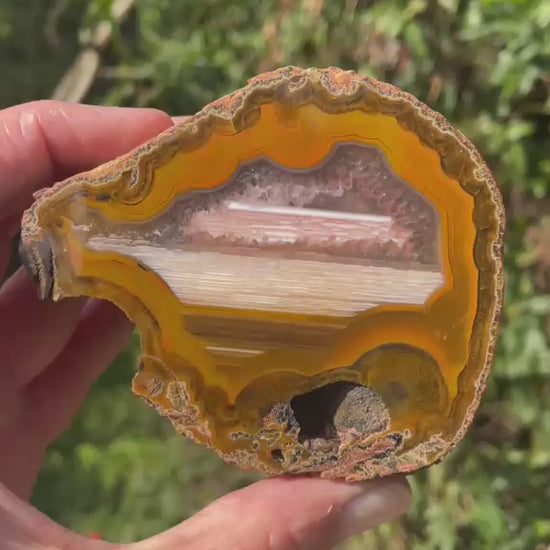 Lilangabi agate 86 mm – rotating view, fortification banding and waterline features | SKU LIL00005