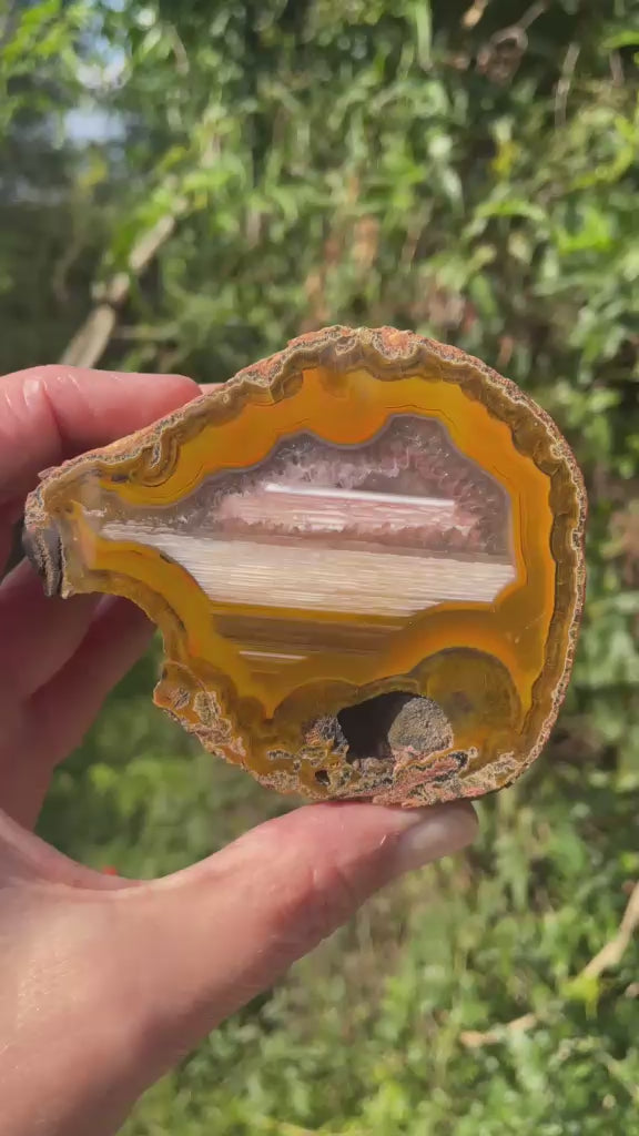 Lilangabi agate 86 mm – rotating view, fortification banding and waterline features | SKU LIL00005