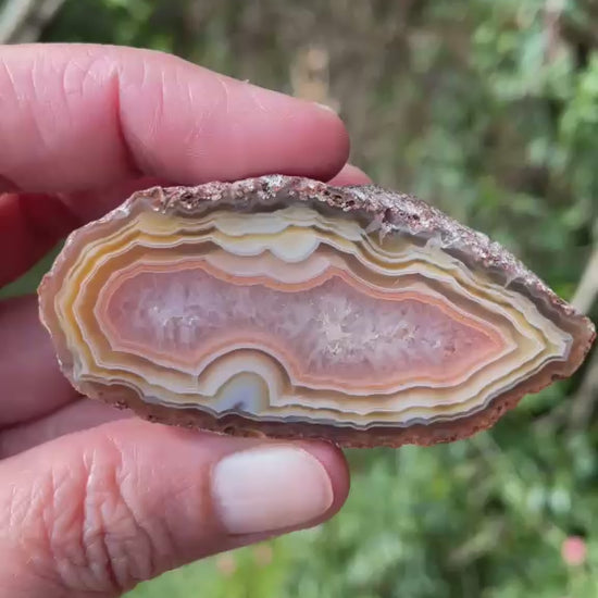 Ghost banding Malawi agate 63mm – rotating view, ghost banding, scalloped banding | SKU 000399